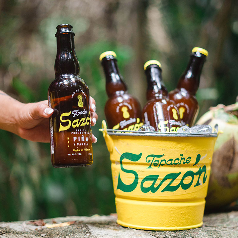 tepache-sazon-bottles-in-bucket-tropical